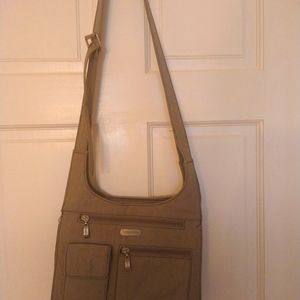 Woman's cross shoulder, mini messager bag.  Baggallini